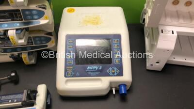 Mixed Lot Including 3 x Cardinal Health Alaris CC Syringe Pumps (All Power Up) 1 x Alaris IVAC P6000, 1 x B & D Nippy 3 Ventilator (Untested Due to Damaged Power Input) 1 x Covidien Heater for Mechanical Nebulization, 1 x Airmed 1000 Compressor, 1 x IVAC - 3