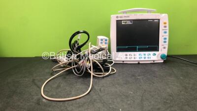 Datex Ohmeda Type F-FM-00 Patient Monitor with 1 x GE Type E-PSMP-00 Module Including ECG, SpO2, T1, T2, P1, P2 and NIBP Options with 1 x 3 Lead ECG Lead and 1 x NIBP Lead with 1 x Adult BP Cuff (Powers Up with Missing Light Cover and Damaged Casing-See P