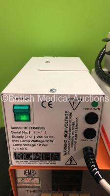 Mixed Lot Including 1 x Baxter Tru Cal Simulator / Tester (Untested Due to Possible Flat Batteries) 1 x Rompa RFED50(99) Lamp Unit (Powers Up) 1 x EMS Therasonic 1030 Unit (Powers Up) 1 x eme Insight 2000 Airway Pressure Monitor (Powers Up with Alarm and - 5