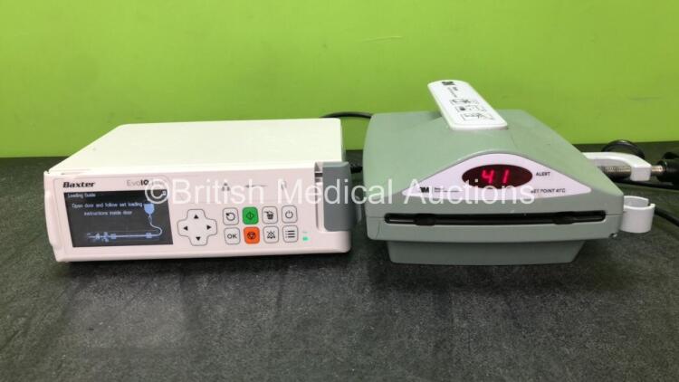 Mixed Lot Including 1 x Baxter Evo IQ LVP Infusion Pump (Powers Up with Damage-See Photos) 1 x 3M Ranger Blood Fluid Warming System (Powers Up with Damage-See Photos) *SN SK00802585, 73675*