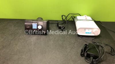 Job Lot Including 1 x ResMed AirSense 10 CPAP Unit with 1 x AC Power Supply (Powers Up with Missing Side Cover-See Photo) 1 x Philips Respironics Dream Station CPAP Unit with 1 x Dream Station Humidifier Unit with 1 x AC Power Supply (Powers Up)