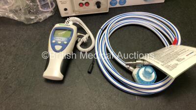 Mixed Lot Including 3 x Suction Cups with Lids, 1 x APC Medical 4170 Bedside External Pulse Generator, 1 x Beurer Medical Steam Vaporizer, 1 x N20 Hose and 1 x Welch Allyn Suretemp Plus Thermometer (Damaged Screen-See Photo) - 4