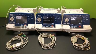 Job Lot Including 3 x Philips Heartstart XL Smart Biphasic Defibrillator Including ECG and Printer Options with 3 x 3 Lead ECG Leads (All Power Up) *SN US00469288 / US00589284 / US00591362*