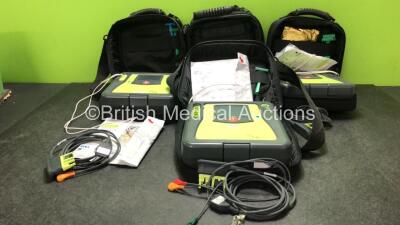 4 x Zoll AED Pro Defibrillators with 4 x Zoll AED Battery Packs, 4 x Electrode Pads and 4 x 3 Lead ECG Leads in Carry Bags (All Power Up) *SN AA13B027592, AA13C027783, AA06I003591, AA09F013908*