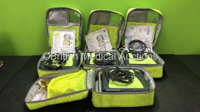 4 x Zoll AED Pro Defibrillators with 3 x Zoll AED Battery Packs, 4 x Electrode Pads and 4 x 3 Lead ECG Leads in Carry Bags (All Power Up) *SN AA10C016657, AA07D005583, AA10C016823, AA13C027905