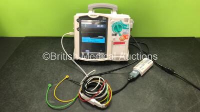 Philips MRx Defibrillator Including Pacer, ECG and Printer Options with 1 x Philips M3538A Battery, 1 x Philips M3539A Module, 1 x Paddle Lead, 1 x 3 Lead ECG Lead and 1 x Philips M3725A Test Load (Powers Up)