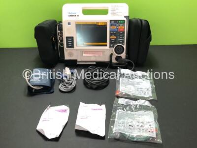 Medtronic Lifepak 12 Biphasic Defibrillator / Monitor Including Pacer, ECG, NIBP, SpO2, CO2 and Printer Options with 1 x SpO2 Finger Sensor, 1 x Paddle Lead and Accessories (Powers Up with Stock Batteries, Batteries Not Included)