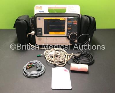 Medtronic Lifepak 12 Biphasic Defibrillator / Monitor Including ECG, NIBP, SpO2, CO2 and Printer Options with 1x 4 Lead ECG Lead, 1 x 6 Lead ECG Lead, 1 x Paddle Lead and Accessories (Powers Up with Stock Batteries, Batteries Not Included)