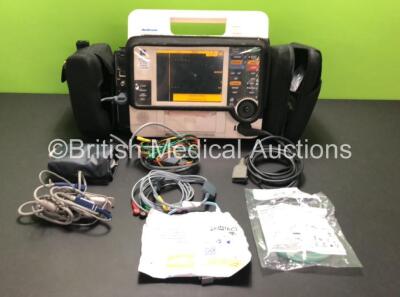 Medtronic Lifepak 12 Biphasic Defibrillator / Monitor Including Pacer, ECG, NIBP, SpO2, CO2 and Printer Options with 1x 4 Lead ECG Lead, 1 x 6 Lead ECG Lead, 1 x SpO2 Finger Sensor, 1 x BP Cuff with Hose, 1 x Paddle Lead, 1 x Electrode Pack *Expired* and 