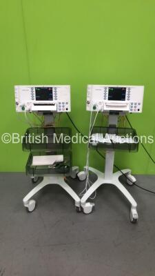 2 x Huntleigh SonicAid FM800 Encore Fetal Monitors on Stands with 2 x US Transducers and 2 x TOCO Transducers (Both Power Up)