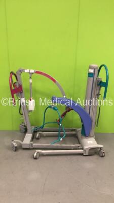 1 x Minstrel Electric Patient Hoist with Controller (Not Power Tested Due to No Battery) and 1 x Arjo Opera Electric Patient Hoist with Battery and Controller (No Power)