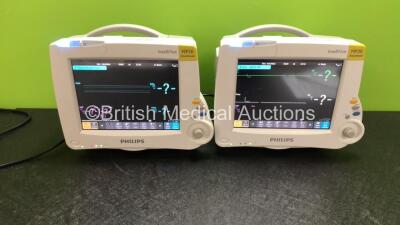 2 x Philips IntelliVue MP30 Anesthesia Patient Monitors (Both Power Up, Both Damaged Casing) with 2 x Philips IntelliVue X2 Patient Monitors with Press, Temp, NBP, SPO2 and ECG Resp Options (Both Power Up)