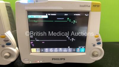 2 x Philips IntelliVue MP30 Patient Monitors with 2 x Philips IntelliVue X2 Patient Monitors with Press, Temp, NBP, SPO2 and ECG Resp Options (All Power Up) - 2