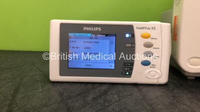 1 x Philips IntelliVue MP30 Patient Monitor (Powers Up, with Damaged Casing, Missing Dial and Scratched Screen-See Photos) 1 x Philips IntelliVue X2 Handheld Patient Monitor Including Press, Temp, NBP, SpO2 and ECG/Resp Options Software Revision J.10.53 w - 2