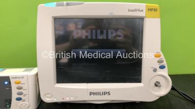 1 x Philips IntelliVue MP30 Patient Monitor (Powers Up, with Damaged Casing, Missing Dial and Scratched Screen-See Photos) 1 x Philips IntelliVue X2 Handheld Patient Monitor Including Press, Temp, NBP, SpO2 and ECG/Resp Options Software Revision J.10.53 w - 3