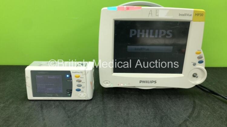 1 x Philips IntelliVue MP30 Patient Monitor (Powers Up, with Damaged Casing, Scratched Screen and Missing Dial-See Photos) 1 x Philips IntelliVue X2 Handheld Patient Monitor Including Press, Temp, NBP, SpO2 and ECG/Resp Options Software Revision H.15.53 w