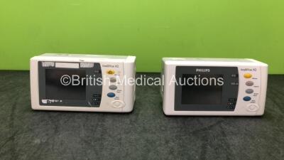 2 x Philips IntelliVue X2 Handheld Patient Monitor Including Press, Temp, NBP, SpO2 and ECG/Resp Options with 2 x Philips MM4607A Batteries(Both No Power with Damaged Cssings-See Photos)