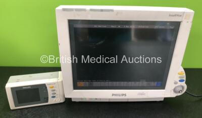 Philips IntelliVue MP70 Patient Monitor M8007A Ref 862451 (Powers Up, Missing Dial and Damaged Casing - See Photos) with 1 x Philips IntelliVue X2 Patient Monitor M3002A Ref 865039 Including ECG/Resp, SpO2, Press, Temp and NBP Options Software Revision G.