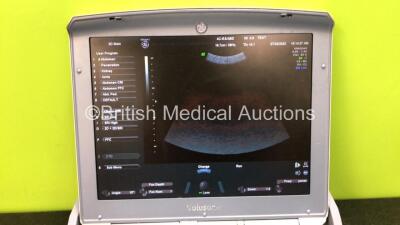 GE Voluson-i BT14 Portable Ultrasound Scanner *Mfd - 03/2004* Software Version - CC200 with 1 x 4C-RS Ultrasound Transducer / Probe *Mfd - 03/2017* (Powers Up with Stock Power Supply, Power Supply Not Included, Slight Damage to Casing - See Photo) *B05047 - 2