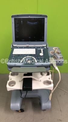 GE Voluson i Portable Ultrasound Scanner *S/N B05046* **Mfd 03/2014* Software Version CC200 (14.0.0.46) BT14 with 1 x Transducer / Probe (4C-RS Ref 5125386 *Mfd 02/2014*) on GE Voluson Dock Cart (Powers Up)