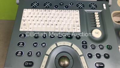 GE Voluson i Portable Ultrasound Scanner *S/N B05046* **Mfd 03/2014* Software Version CC200 (14.0.0.46) BT14 with 1 x Transducer / Probe (4C-RS Ref 5125386 *Mfd 02/2014*) on GE Voluson Dock Cart (Powers Up) - 3