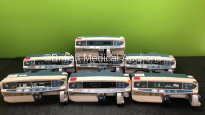 Job Lot Including 4 x Cardinal Health Alaris GH Syringe Pumps, 1 x Asena GS Syringe Pump, 1 x Asena GS MK III and 1 x Asena CC Syringe Pump (All Power Up, 1 x SP2 Code, 1 x SF3 Code, 1 x Damaged Switch - See Photos) *SN 800300849 / 800289054 / 800290236 /