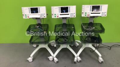 3 x Huntleigh SonicAid FM800 Encore Fetal Monitors on Stands (All Power Up) *751DX0501349-13 / 751DX0501335-13 / 751DX0501336-13*