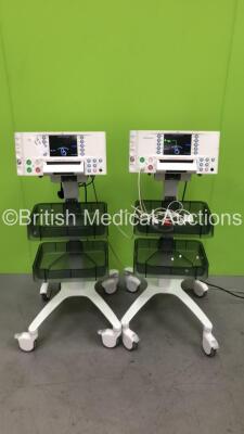 2 x Huntleigh SonicAid FM800 Encore Fetal Monitors on Stands with 1 x US Transducer (Both Power Up with 1 x Missing Power Button) *751D0501359-13 / 751D0501357-13*