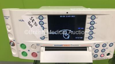 2 x Huntleigh SonicAid FM800 Encore Fetal Monitors on Stands with 1 x US Transducer (Both Power Up with 1 x Missing Power Button) *751D0501359-13 / 751D0501357-13* - 3