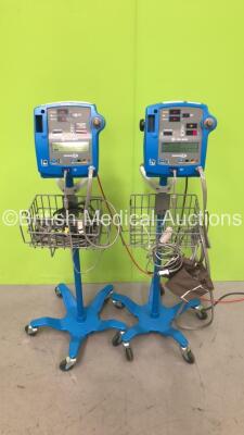 2 x GE Dinamap 400V2 Vital Signs Monitors on Stands with SPO2 Finger Sensors, BP Hoses and Cuffs (Both Power Up)