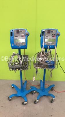 2 x GE Dinamap 400V2 Vital Signs Monitors on Stands with SPO2 Finger Sensors, BP Hoses and Cuffs (Both Power Up)