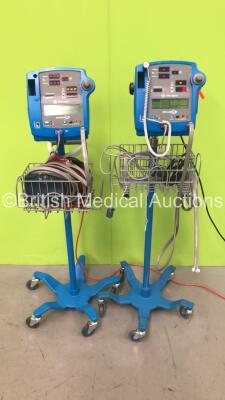 2 x GE Dinamap 400V2 Vital Signs Monitors on Stands with SPO2 Finger Sensors, BP Hoses and Cuffs (Both Power Up)