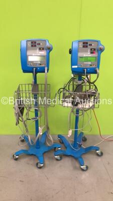 2 x GE Dinamap 300V2 Vital Signs Monitors on Stands with SPO2 Finger Sensors, BP Hoses and Cuffs (Both Power Up)