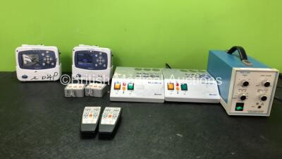 Mixed Lot Including 2 x Welch Allyn Propaq LT Patient Monitors Including ECG,/EKG, SpO2 and NIBP/PSNI Options with 2 x Charging Cradles (1 Powers Up, 1 No Power) 2 x Smith & Nephew Ref 72200891 Wireless Remote Controls, 2 x Smith & Nephew Lewlert II Units