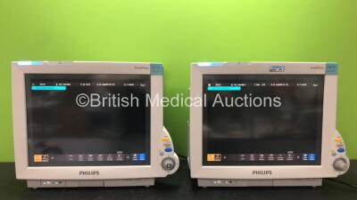 2 x Philips IntelliVue MP70 Neonatal Patient Monitors (Both Power Up, 1 with Missing Dial-See Photo) *SN DE843B1323, DE84381332*