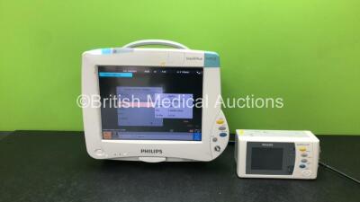 Philips IntelliVue MP50 Patient Monitor *Mfd 2012* (Powers Up with Missing Dial-See Photo) 1 x Philips Press Module (Missing Cover-See Photo)1 x Philips IntelliVue X2 Handheld Patient Monitor *Mfd 2013* Including ECG, SpO2, NBP, Temp and Press Options wit