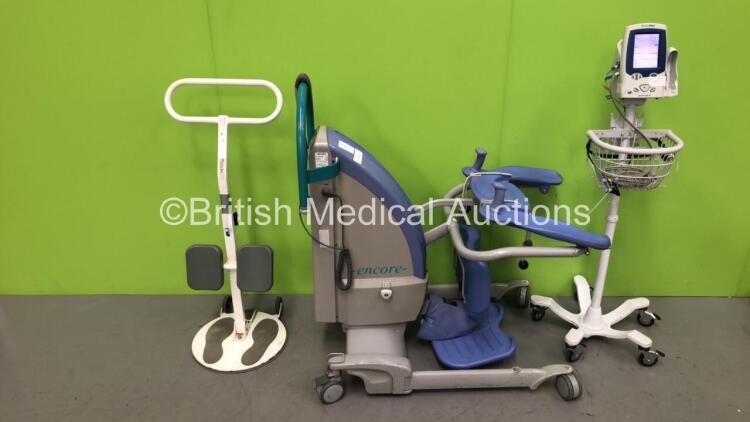 1 x Arjo Encore Electric Patient Hoist with Controller and Battery (Powers Up), 1 x Welch Allyn Vital Signs LXi Patient Monitor on Stand (Powers Up) and 1 x Turner Table