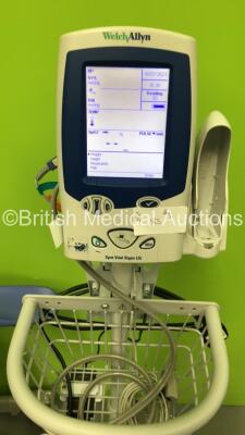 1 x Arjo Encore Electric Patient Hoist with Controller and Battery (Powers Up), 1 x Welch Allyn Vital Signs LXi Patient Monitor on Stand (Powers Up) and 1 x Turner Table - 2