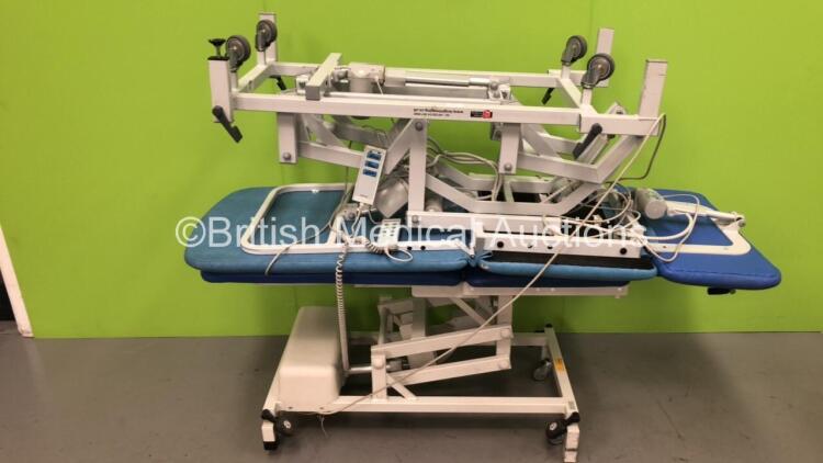 1 x Knight Imaging Electric Patient Examination Couch with Controller and 1 x Huntleigh Akron Electric Patient Hoist with Controller (Both Power Up) *S/N 767469*