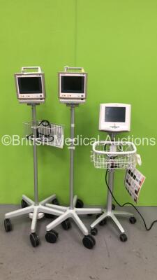 1 x Cheetah Medical Nicom Monitor on Stand (Powers Up) with 1 x Philips M3046A M4 Patient Monitor on Stand and 1 x Philips M3046A M3 Patient Monitor on Stand (Both No Power)