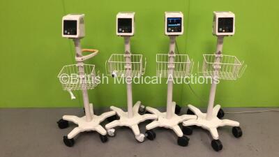 4 x Philips SureSigns VS2+ Patient Monitors on Stands (All Power Up)