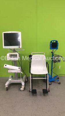 1 x Seca Wheelchair Weighing Scales, 1 x GE Dinamap ProCare Auscultatory Vital Signs Monitor on Stand with BP Hose and 1 x GE D19KT Display Monitor with GE F5-01 Module Rack (Powers Up) *S/N DTL471K2729*