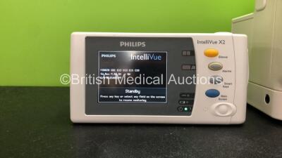 1 x Philips IntelliVue MX400 Patient Monitor Software Revision L.01.12 with 1 x Philips X2 Handheld Patient Monitor Including ECG, SpO2, NBP, Press and Temp Options Software Revision M.03.01 with 1 x Philips M4607A Battery (Both Power Up) - 3