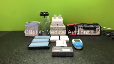 Mixed Lot Including 1 x Fisher & Paykel MR850AEK Respiratory Humidifier Unit (Powers Up with Cracked Casing-See Photos) 3 x Philips M4605A Batteries *All Untested* 1 x Zoll AED 3 Battery Pack *Untested* 1 x Bladder Scan Ref 0570-0193 Battery Charger with 