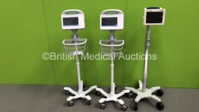 1 x Welch Allyn ProPaq CS Patient Monitor on Stand and 2 x Welch Allyn 6000 Series Vital Signs Monitors on Stands (All Power Up)