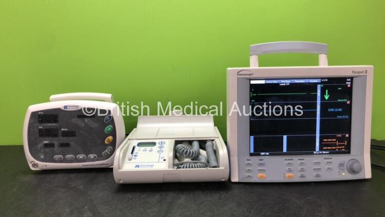 Mixed Lot Including 1 x Huntleigh Smartsigns Lite Plus Patient Monitor (No Power) 1 x Huntleigh MD200 Doppler Unit (Powers Up) 1 x Datascope Passport 2 Patient Monitor Including ECG, SpO2 and T1 Options (Powers Up)