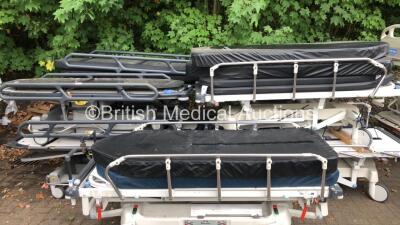 3 x Huntleigh Lifeguard Hydraulic Patient Trolleys, 5 x Anetic Aid QA3 Patient Trolleys ,1 x Portsmouth Surgical Equipment QA2 Hydraulic Patient Trolley and 9 x Mattresses