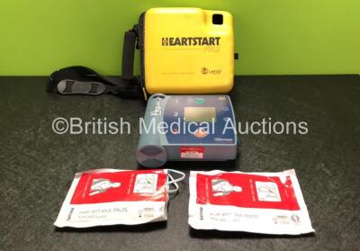 Laerdal Heartstart FR2 Defibrillator in Carry Bag with 2 x Electrode Packs *Both Expired* (Powers Up and Pass Self Test with Low Battery) *SN 0301025753*