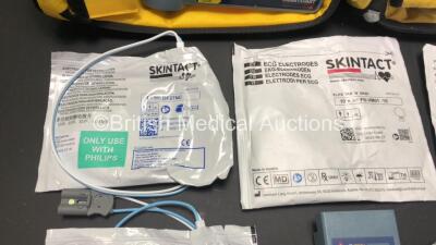 2 x Laerdal Heartstart FR2 Defibrillators in Carry Bags with 3 x Philips M3863A Batteries and 5 x Electrode Packs *3 x Expired* (Both Power Up and Pass Self Tests) **SN 1002073519 / 1002073515** - 6