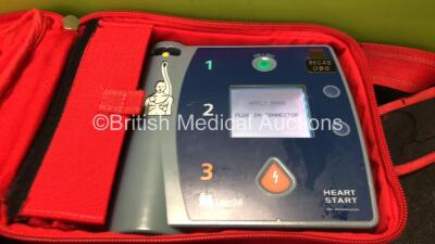 2 x Laerdal Heartstart FR2+ Defibrillators with 4 x Philips M3863A Batteries *Install Dates 07-2021, 11-2023, 12-2015, 04-2020* In 2 x Carry Bags (Both Power Up and Pass Self Tests) *SN 0307227573, 0207226092* - 2